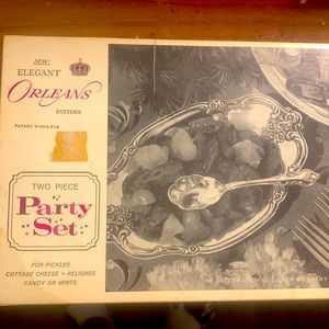 I am selling a 2 piece party set  “Elegant Orleans pattern”